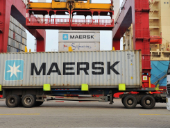 --FILE--A truck transports a container of Maersk unloaded from a container ship on a quay at the Port of Qingdao in Qingdao city, east China's Shandong province, 12 April 2016.

Maersk Line, the world's biggest container shipper, has decided to stop services to and from 10 ports in China as part of a drive to reduce costs. Maersk Line said it would stop serving ports in Chizhou, Luzhou, Yingkou, Jinzhou, Rizhao, Yueyang, Lijiao, Taiping, Jiaoxin and Nansha old port. The ports are currently served by feeder vessels that move goods to larger ports where mega-vessels with capacity of up to 20,000 20-foot containers take over and transport the goods to ports mostly in Europe and the United States.
No Use China. No Use France.